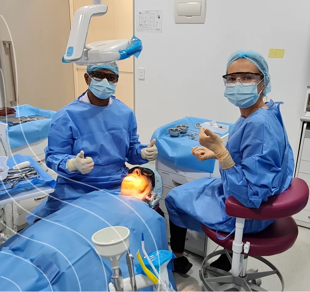 Dr Raghu and team performing single tooth implant procedure